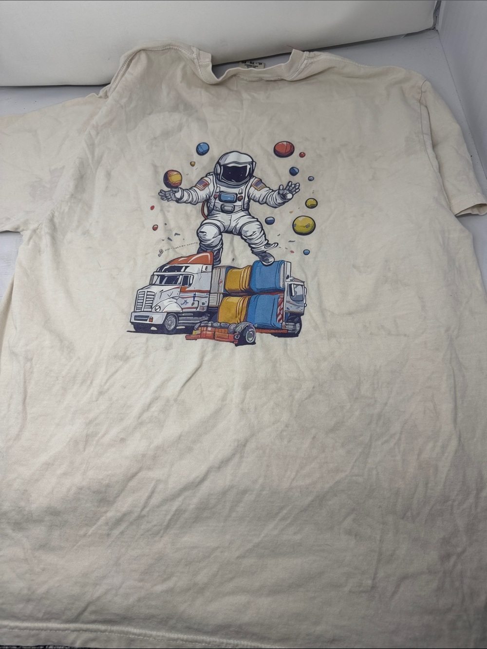 Comfort Colors Cream Kids Tee with Astronaut and Colorful Truck Graphic
